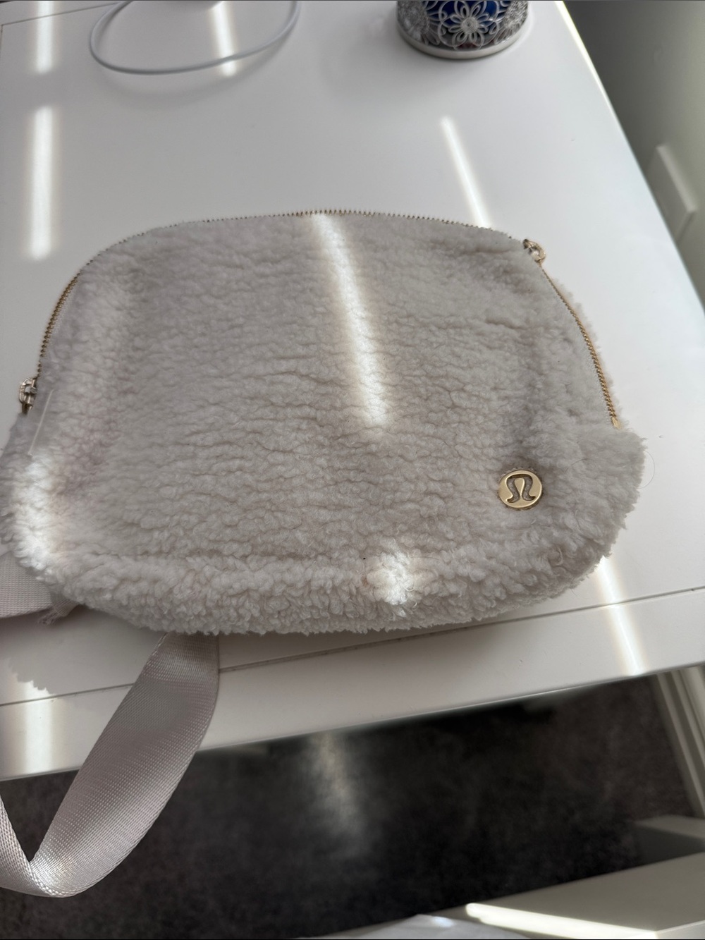 lululemon athletica Cream Shearling Crossbody Pouch with Gold Logo